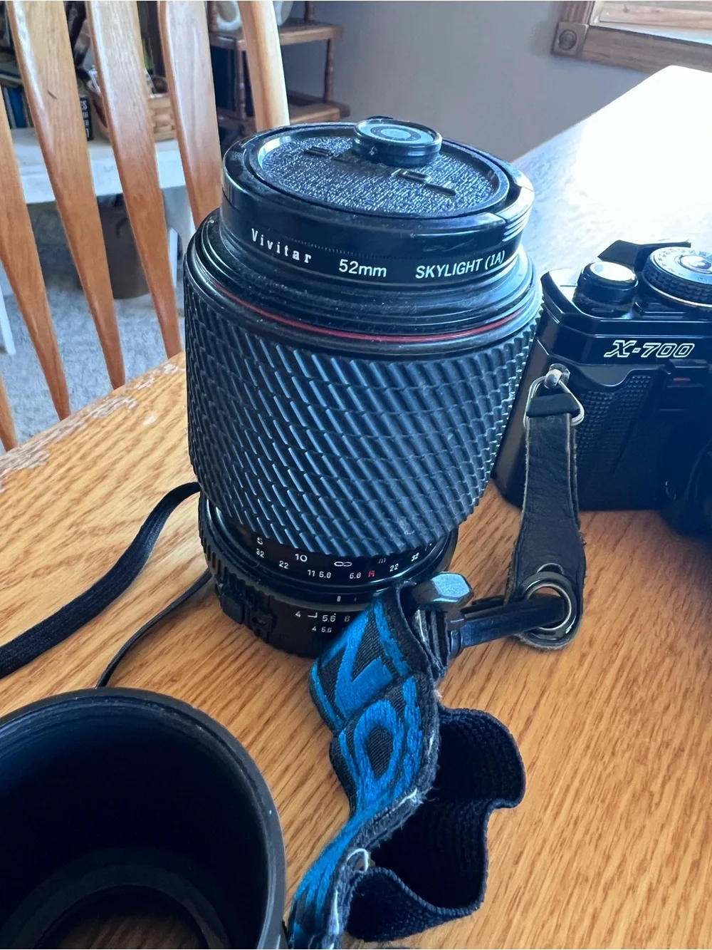 Minolta X-700 Film Camera with Black/Blue Strap, lens, adapter, auto thyristor